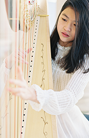 Competition Winner and harp soloist Charlotte Trinh