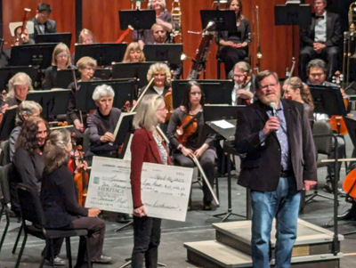 April 2024 concert presentation of check from Guild to LAS Assn.