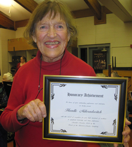 photo of Hazelle Miloradovitch with certificate
