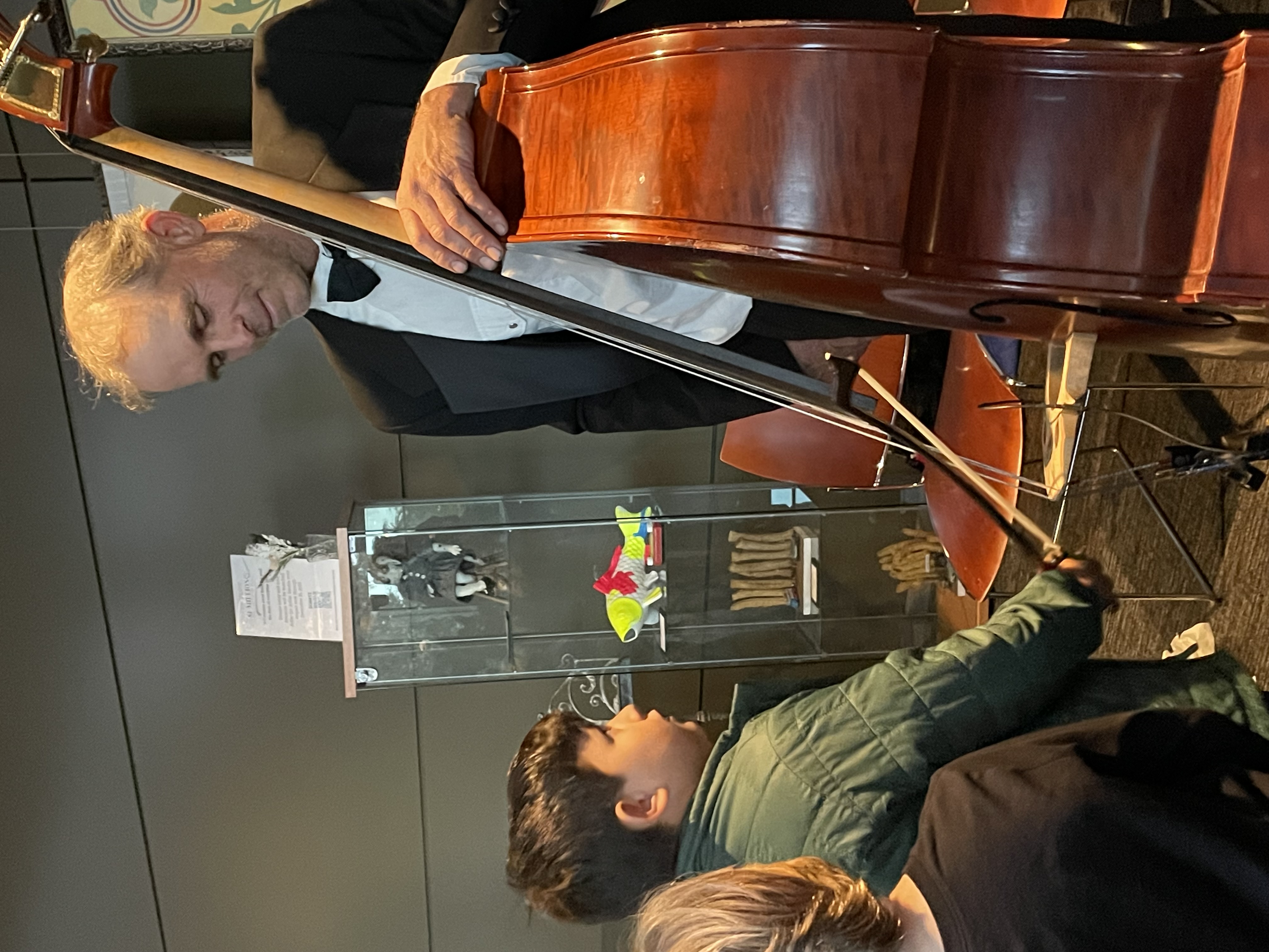 child meets string bass with LAS player Richard Hibbs