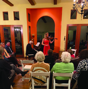 Elizabeth Pitcain performing at the LAS Guild soiree on 4/11/25