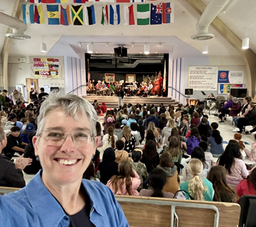 Lara Webber in Croce School multipurpose room with school audience