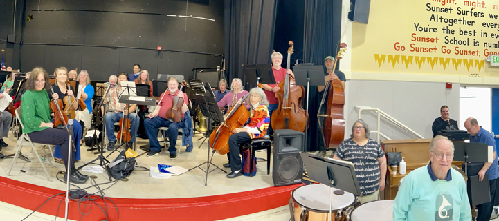 orchestra getting ready to play at Sunset School